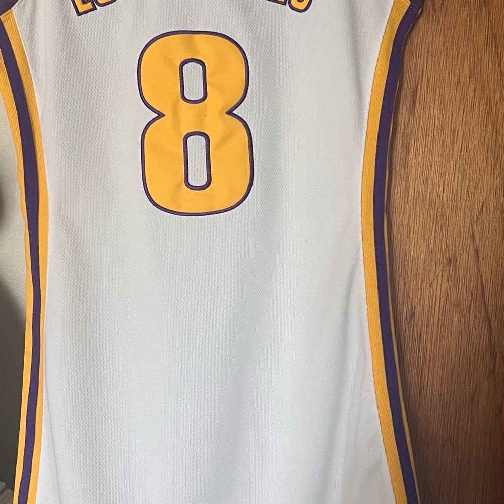 White and Yellow Basketball Jersey with Classic Design